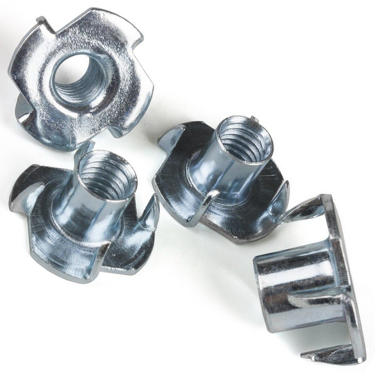 Zinc plated tee nuts with four prongs and metric internal thread