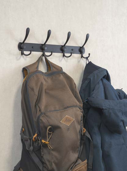 4-hook black wall coat rack holding a backpack and jacket