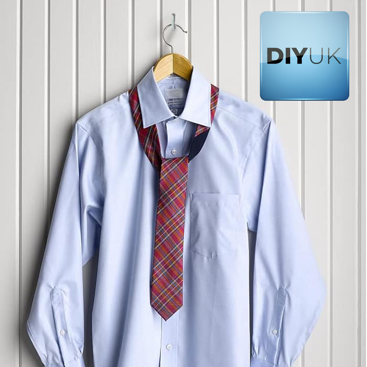 A shirt and tie on a hanger hung from a white zinc-plated L-hook screw