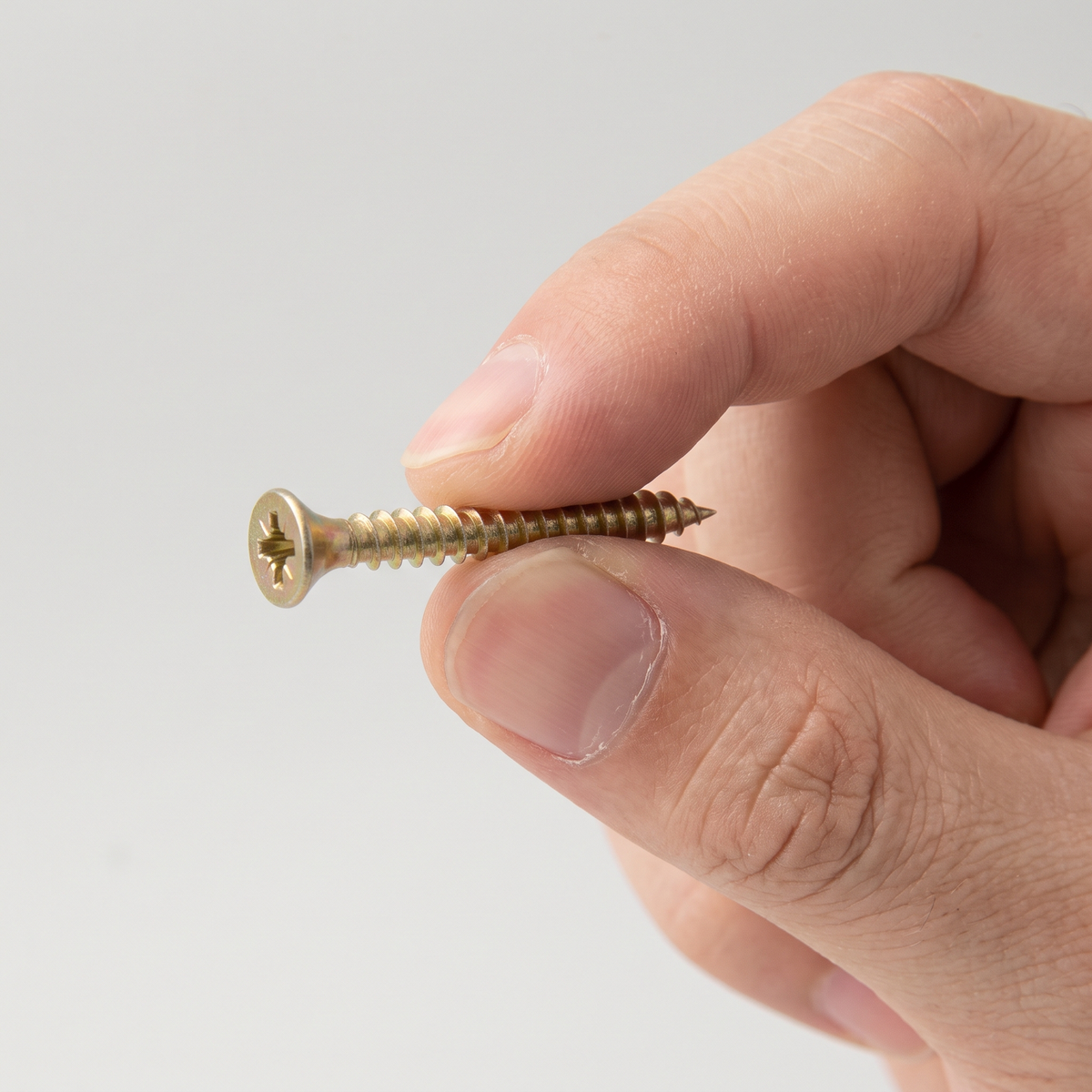 Premium Multi-Purpose Wood Screws | YZP Pozi Countersunk, shown in hand for scale